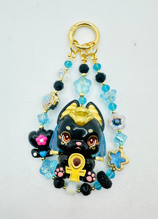 Cleo inspired bag charm