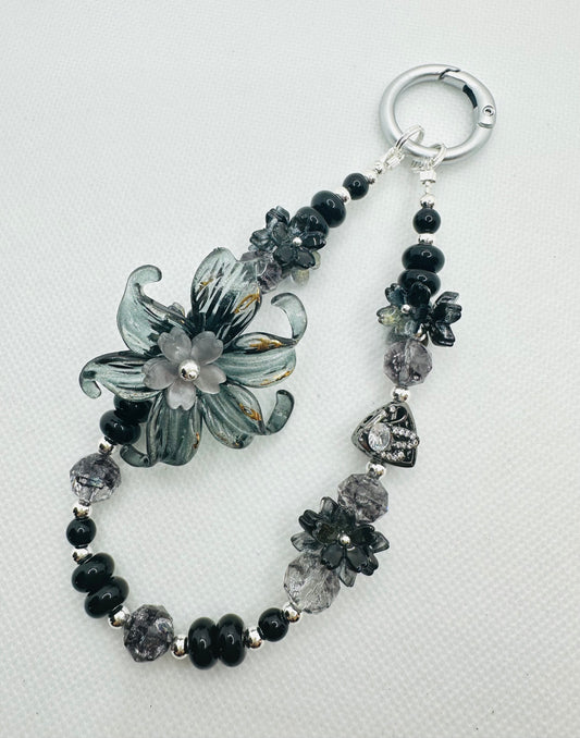Black floral charm