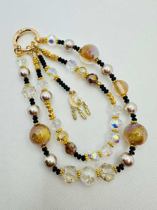 Black and Gold resin bag charm
